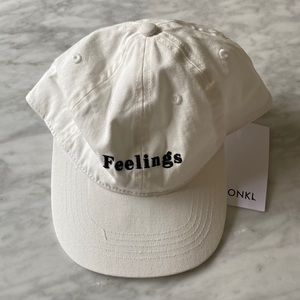 NWT “feelings” hat